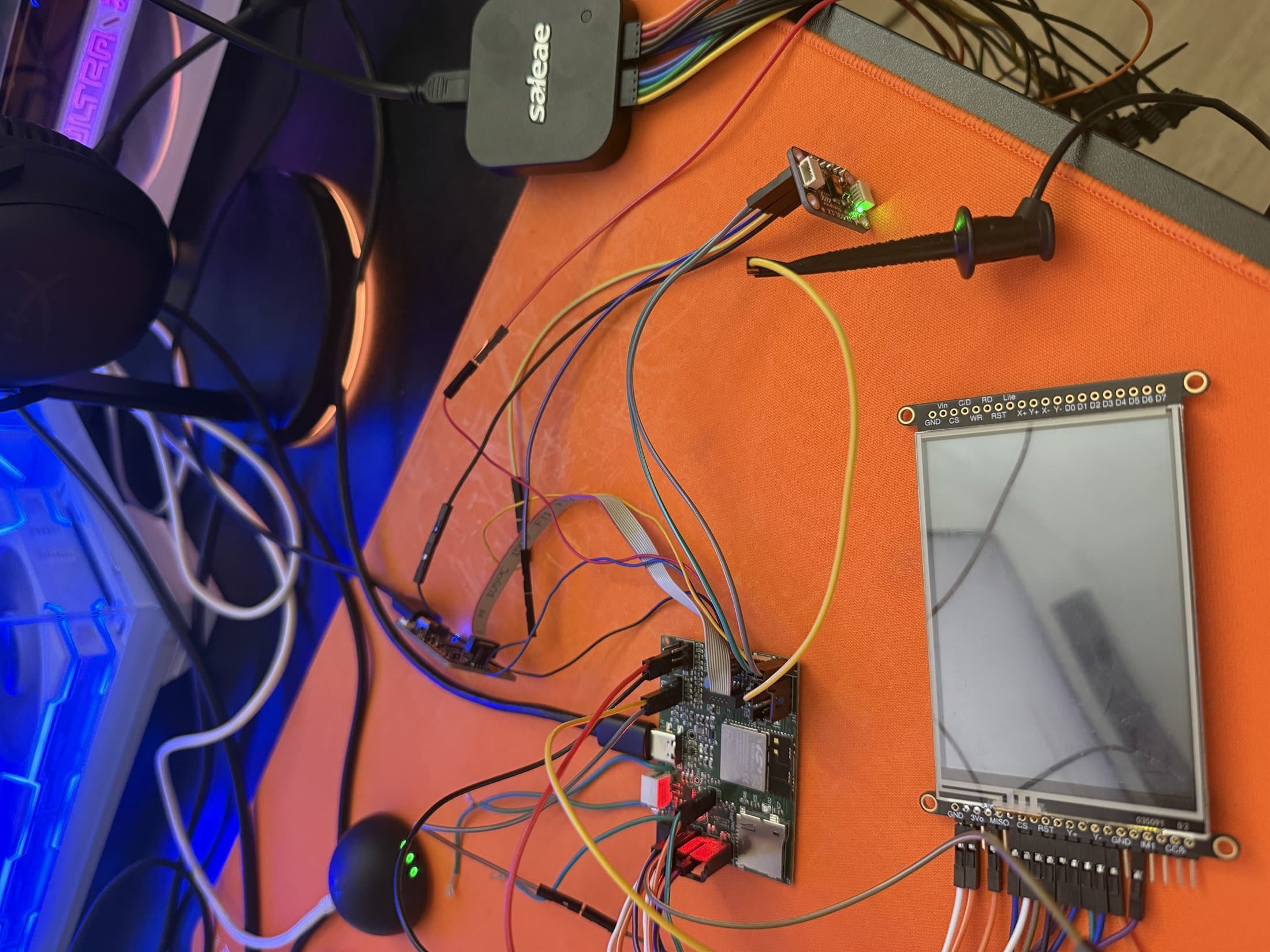 Logic analyzer and wires connected during early Velo signal debugging.